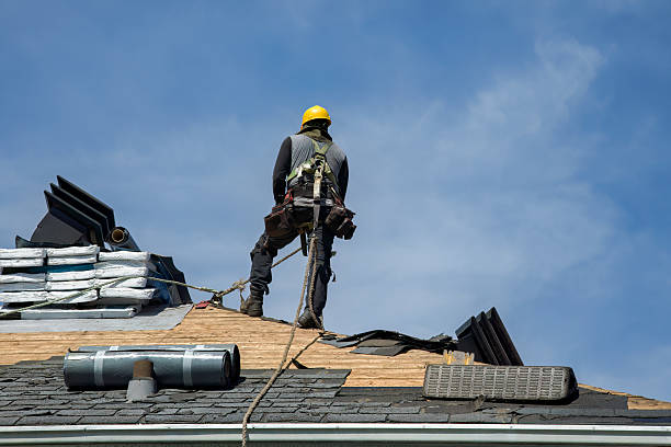 Professional Gutter Installation technician working in South Beach, FL